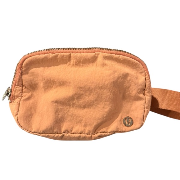 lululemon athletica Handbags - Lululemon light Orange Belt Bag